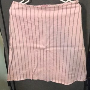 Adorable pink with black stripes skirt.